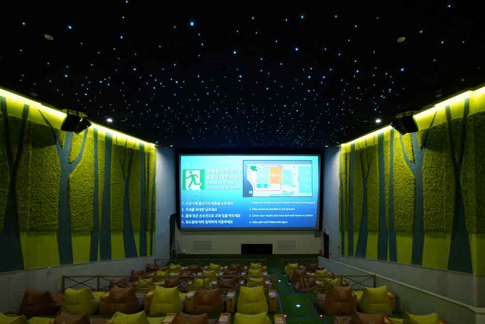 Semi-non-combustible Scandia moss wall greening interior featuring a Nordic forest - CGV Bucheon Cine & Foret Theater